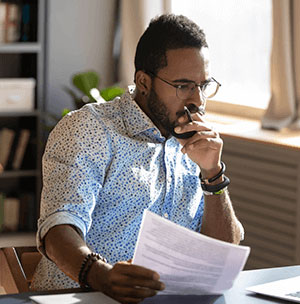 guy-with-paper-in-hands salesforce cloud services consultant